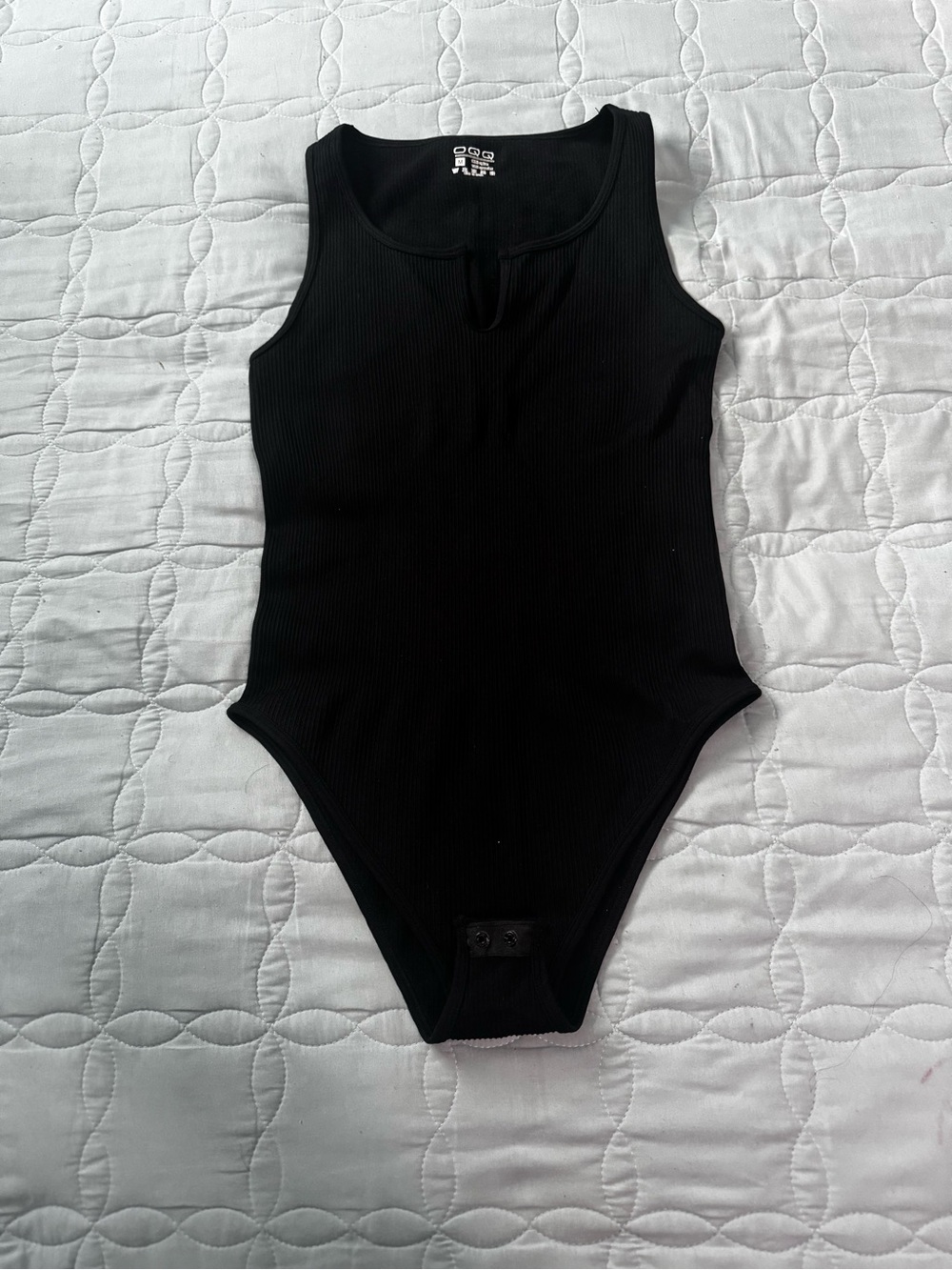 OQQ Black Ribbed One-Piece Bodysuit Sz M